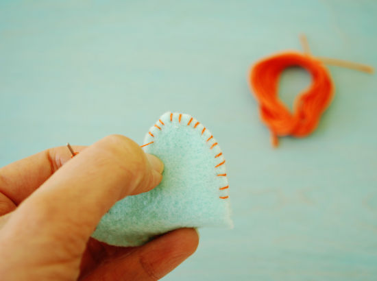 whipstitch around felt edge