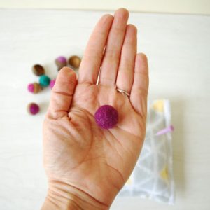 felted purple wool ball